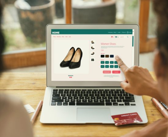 Woman shopping online on internet marketplace browsing for crucial sale items Woman shopping online on internet marketplace browsing for sale items for modern lifestyle and use credit card for online payment from wallet protected by crucial cyber security software